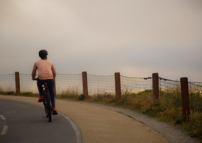 Bicyclist Looks at Golden Gate Bridge